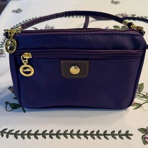 Elegant Purple Crossbody Bag with Gold Accents